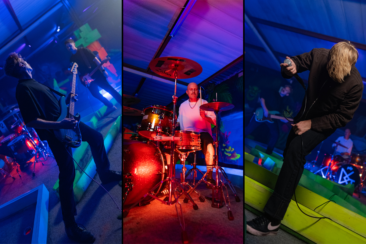 Francois van Coke and Die Gevaar performing under vibrant, colourful lighting